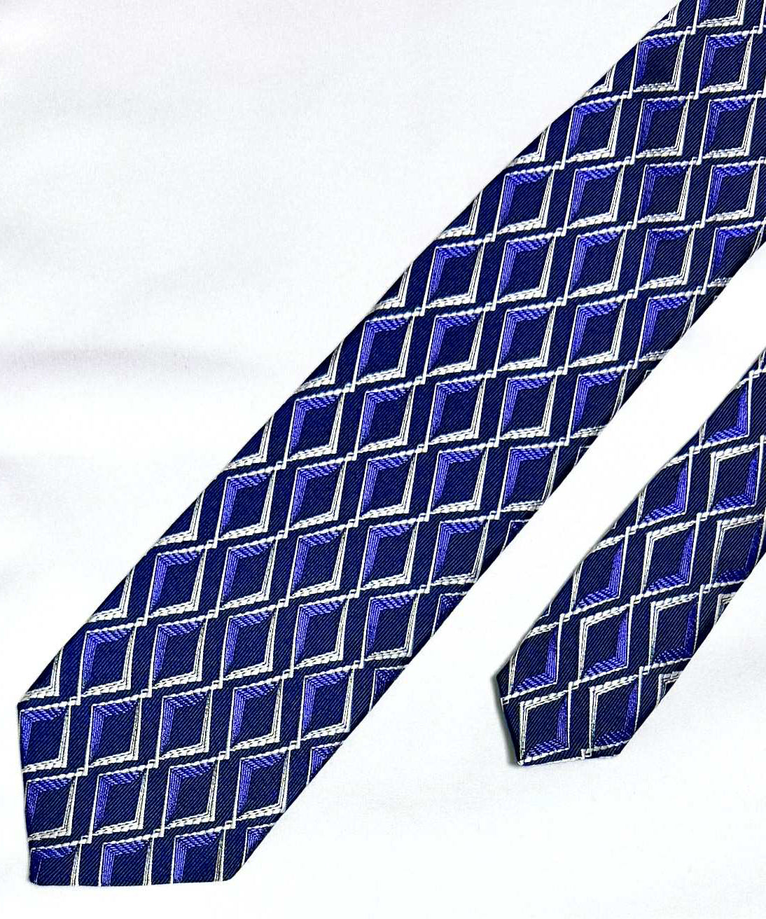 Franco Spada ( フランコスパダ )🆕コンテンポラリーブリティッシュダイヤモンドシェイプJQネクタイ：ネイビー×パープル