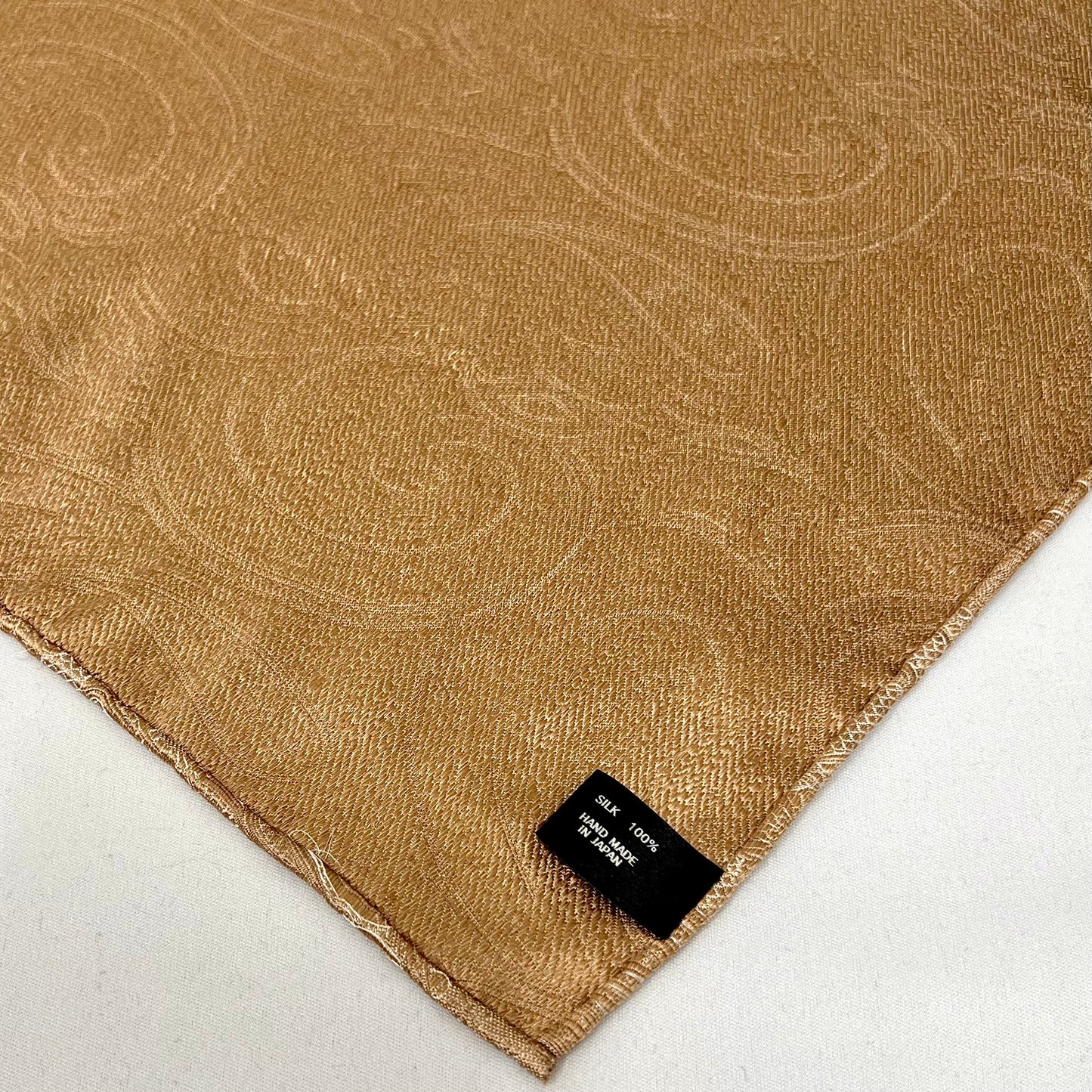 Franco Spada ( フランコスパダ )ハンドロール(手巻き)ポケットチーフ (メランジ無地調大更紗ペーズリー)：シャンパンベージュ