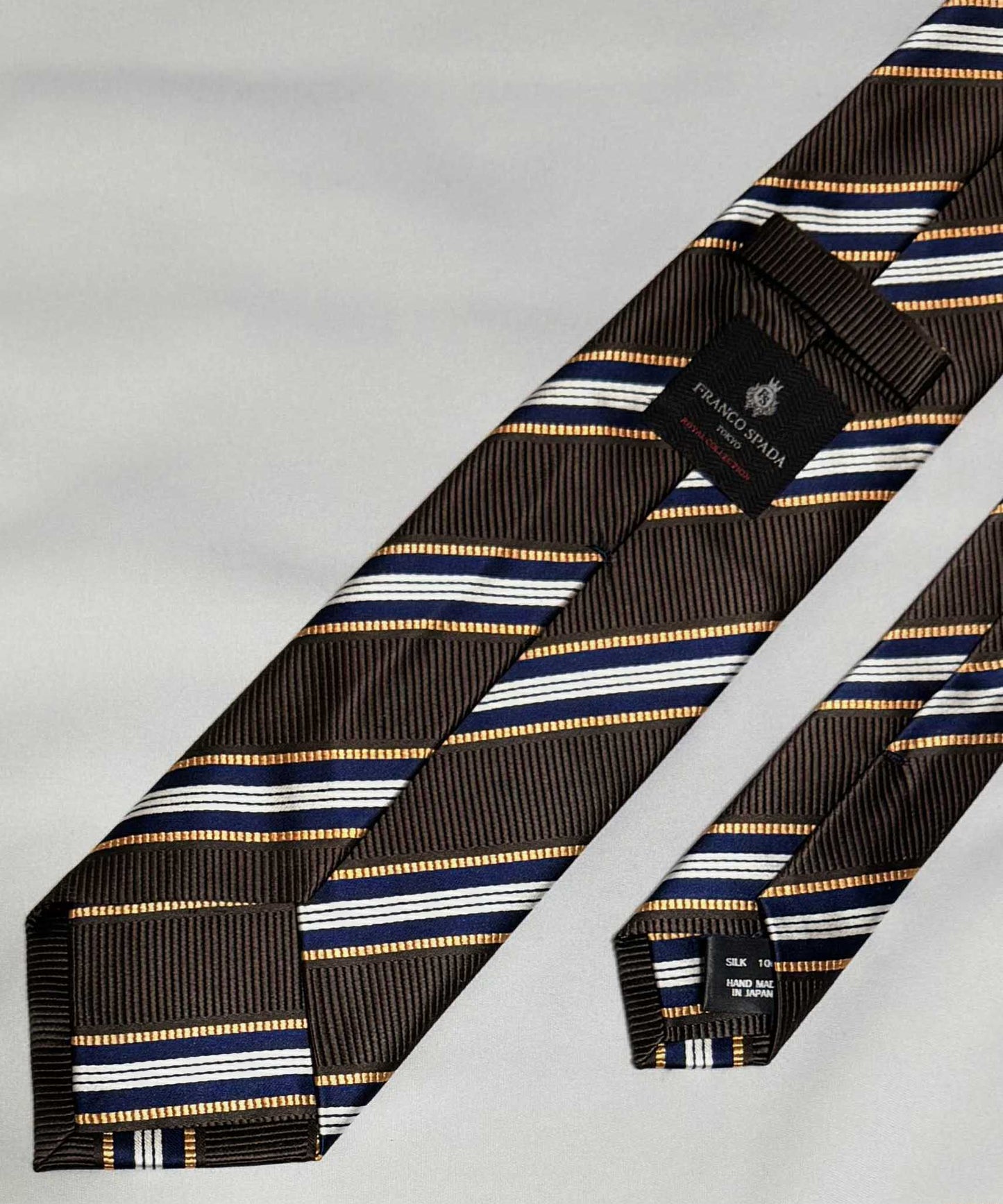 Franco Spada ( フランコスパダ )🆕コンテンポラリーブリティッシュレジメンタルストライプネクタイ：ブラウン×ネイビー×Lオレンジ